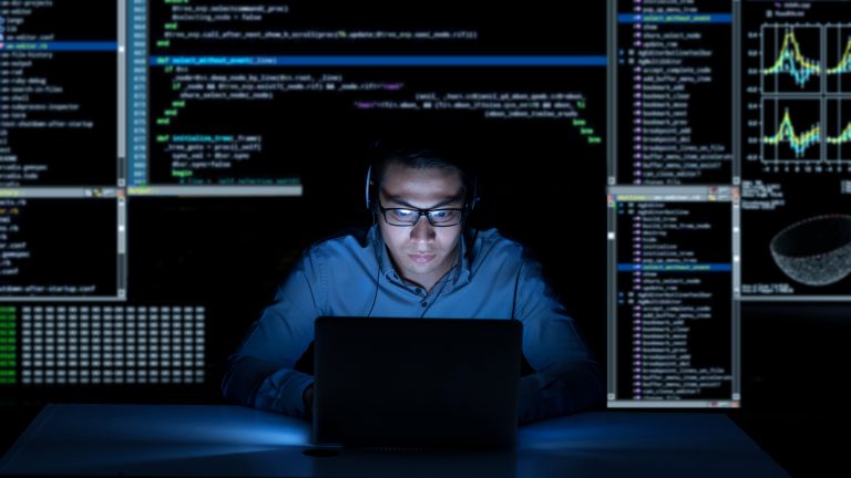 Man surrounded by codes