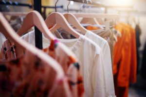 Clothes hanging in rack