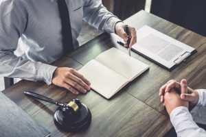 A lawyer taking to a client in an office