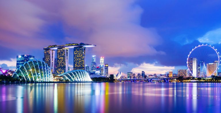 Skyline of the business district of Singapore after sunset.