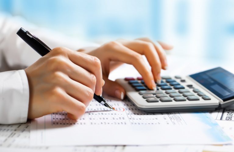 a person computing the finances