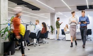 healthy office with people walking back and forth